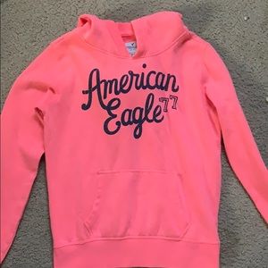 A pink American eagle sweatshirt